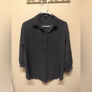 Black and white polka-dot blouse